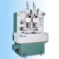 Vertical two-station honing machine